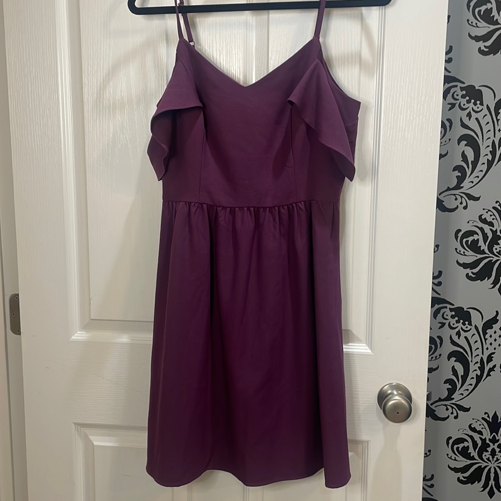 Purple mini dress with peekaboo back opening